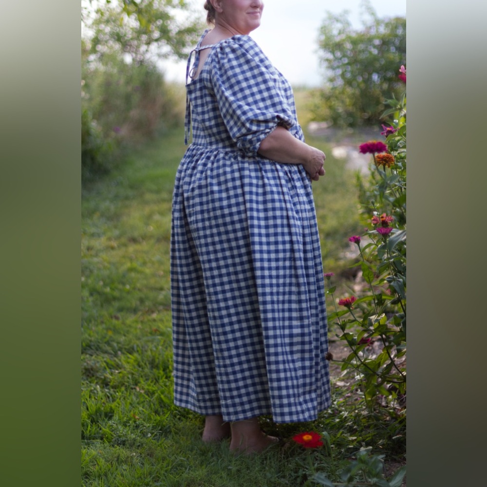 Handmade dress with curved waist detail and back ties